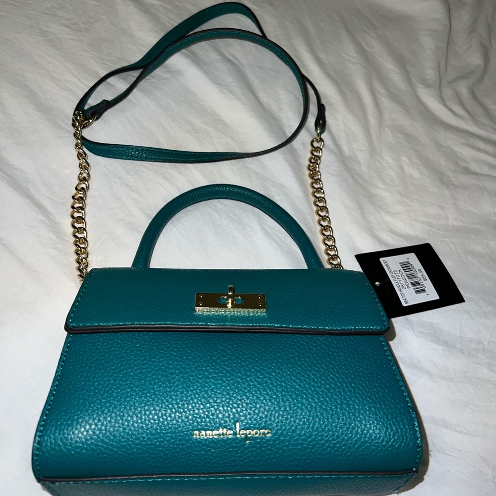NWT Nanette lepore
Bea top handle flap crossbody peacock green 68 to 54 obo